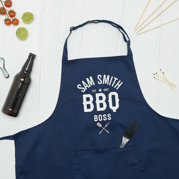 https://sundaysdaughter.com/cdn/shop/products/personalised-barbecue-boss-apron-639049_grande.jpg?v=1625560129