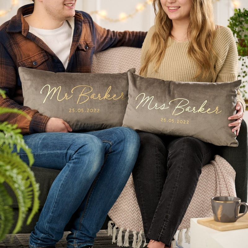 Matching personalised couples cushions with names and date
